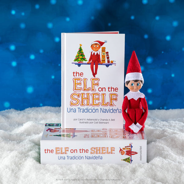 The The Elf on the Shelf UNA Tradicin Navidea Spanish Language Book & Blue-Eyed Boy Scout Elf